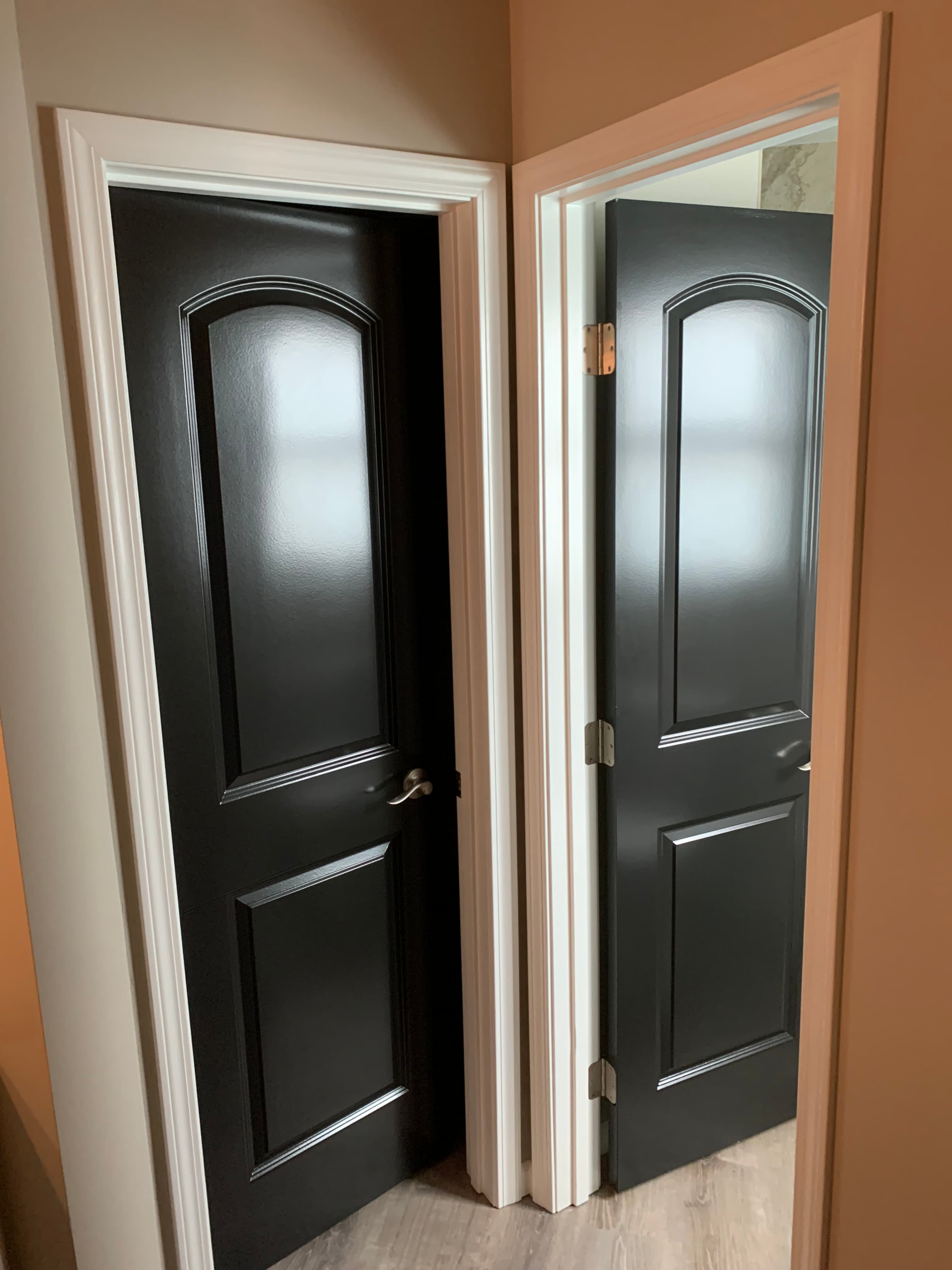 Interior doors completed with a smooth black sprayed finish